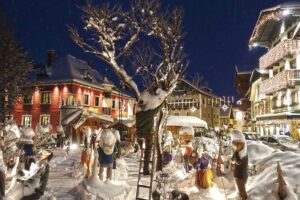 Romantic winter scene in snowy St. Wolfgang, with holiday lights and cozy ambiance.