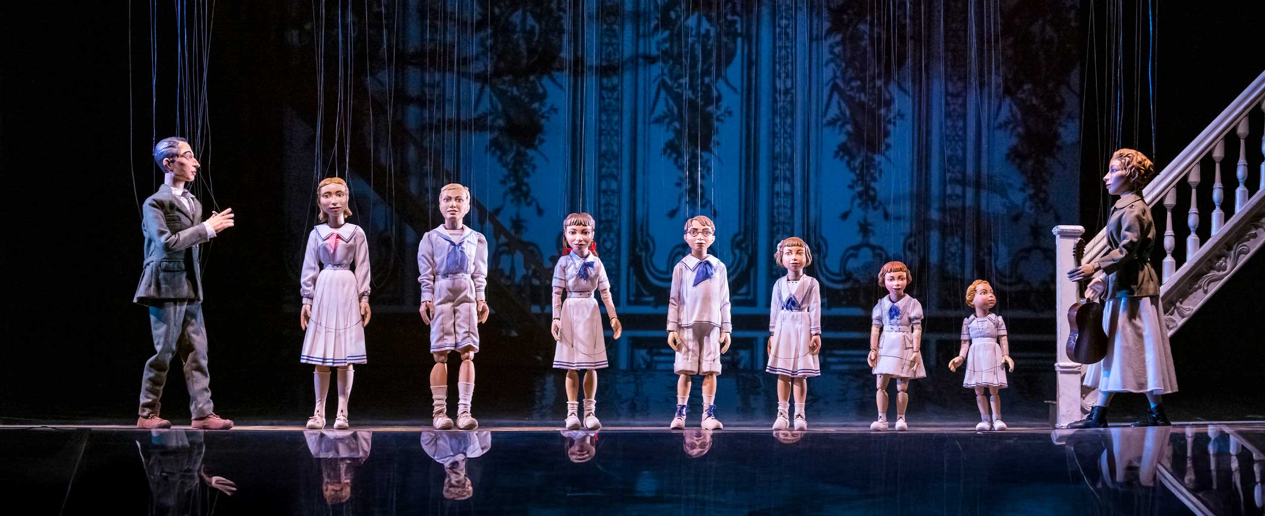 Sound of Music Salzburg Marionette Theater stage scene Sound of Music Salzburg Marionette Theater performance with von Trapp children on stage